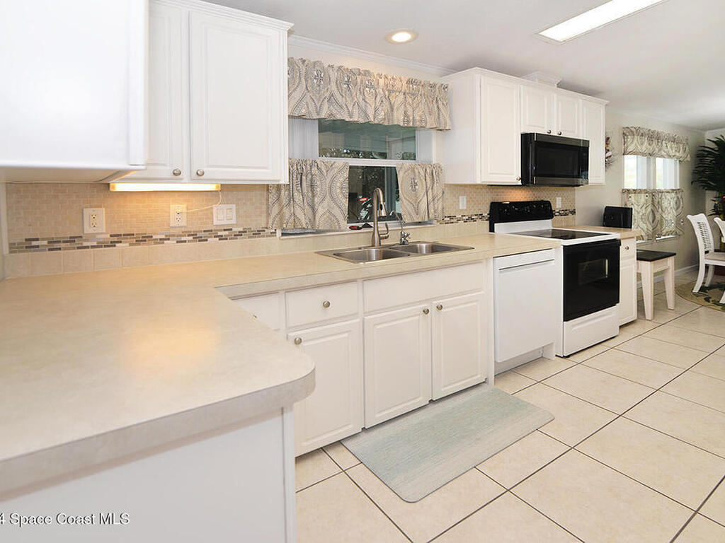 629 Amber Jack Court, Barefoot Bay, FL 32976