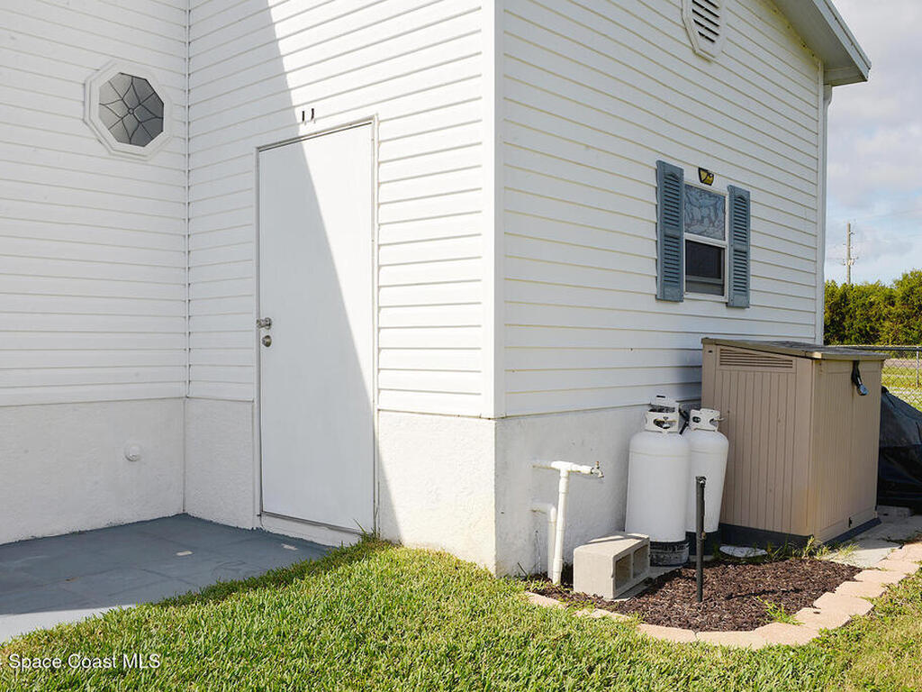 629 Amber Jack Court, Barefoot Bay, FL 32976