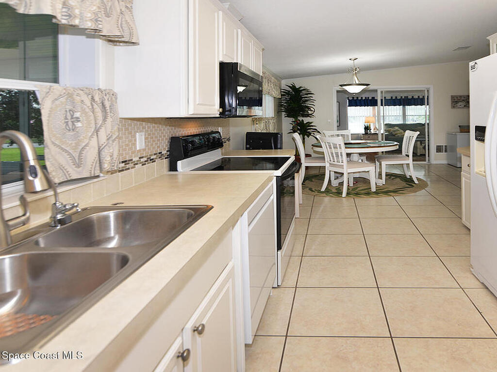 629 Amber Jack Court, Barefoot Bay, FL 32976