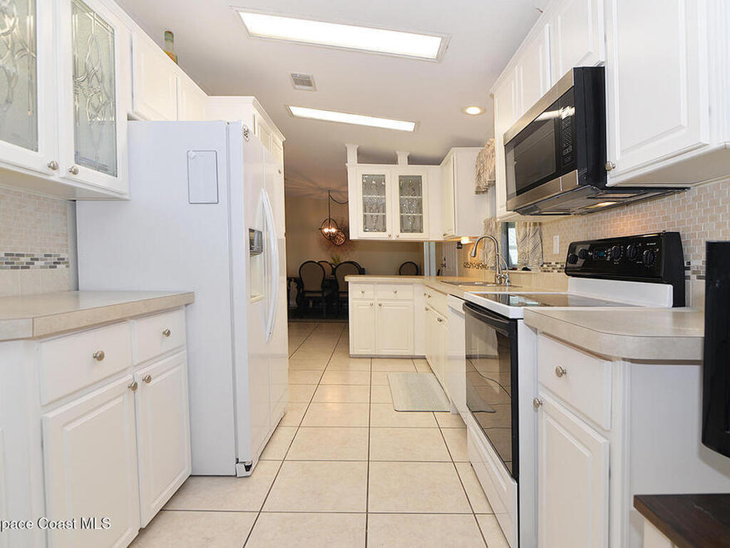 629 Amber Jack Court, Barefoot Bay, FL 32976