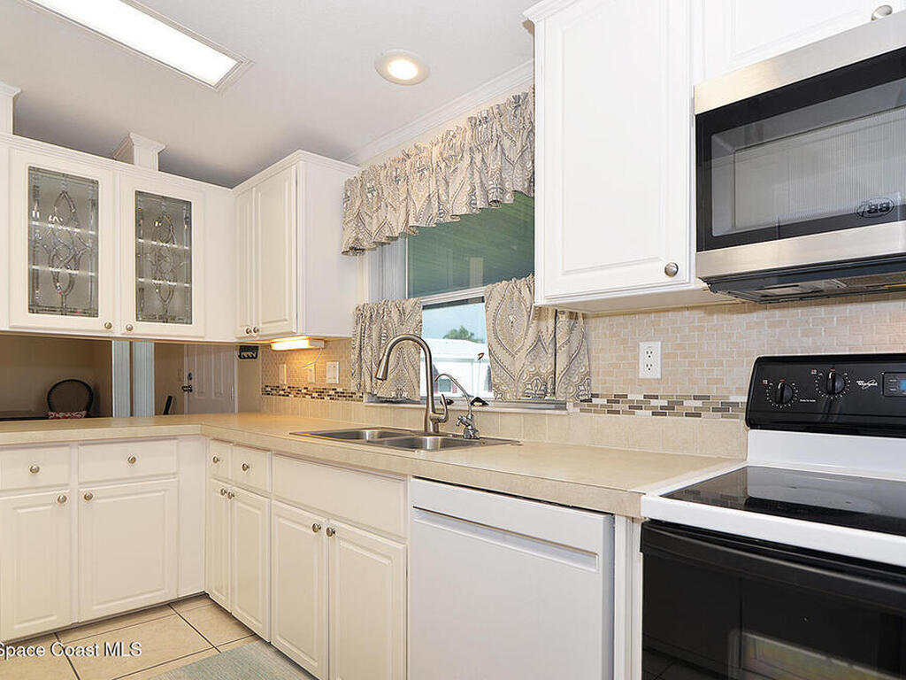 629 Amber Jack Court, Barefoot Bay, FL 32976