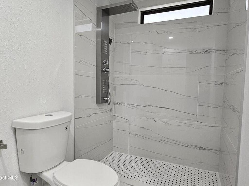 804 Waterway Drive, Barefoot Bay, FL 32976