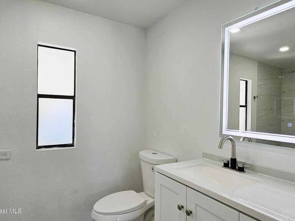 804 Waterway Drive, Barefoot Bay, FL 32976