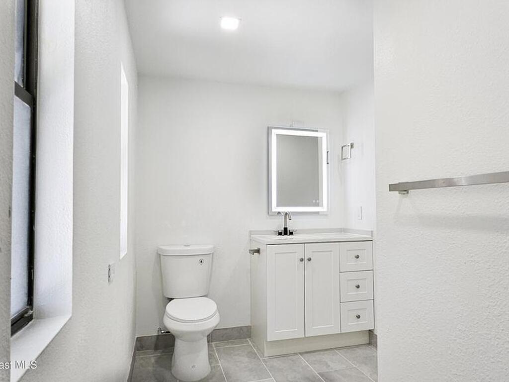 804 Waterway Drive, Barefoot Bay, FL 32976