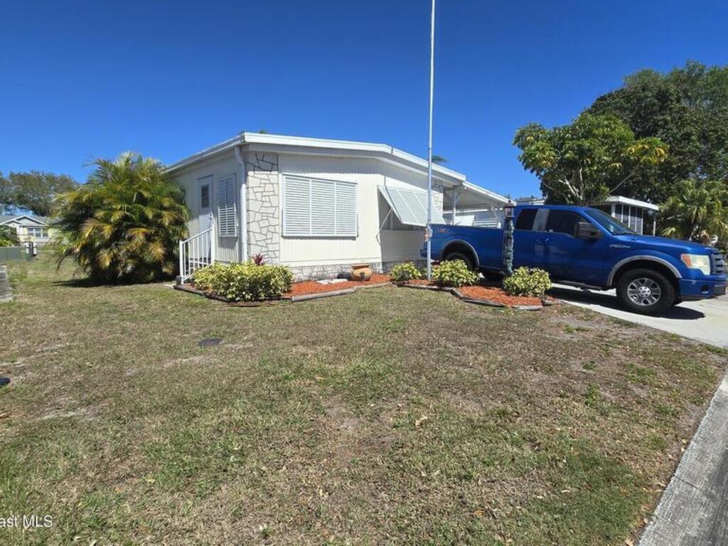 861 Pecan Circle, Barefoot Bay, FL 32976