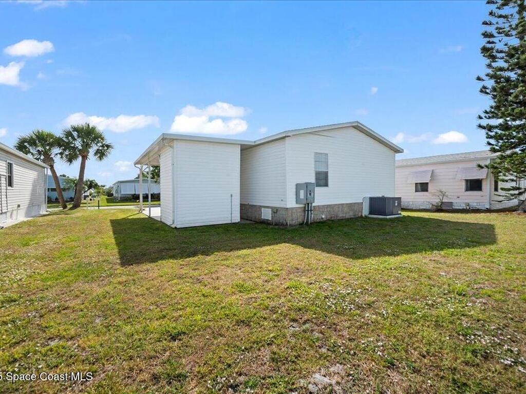 641 Hyacinth Circle, Barefoot Bay, FL 32976