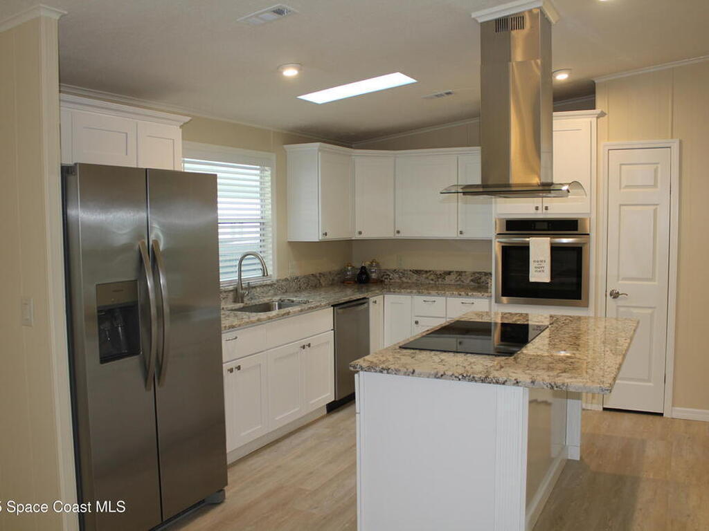 449 Dolphin Circle, Barefoot Bay, FL 32976