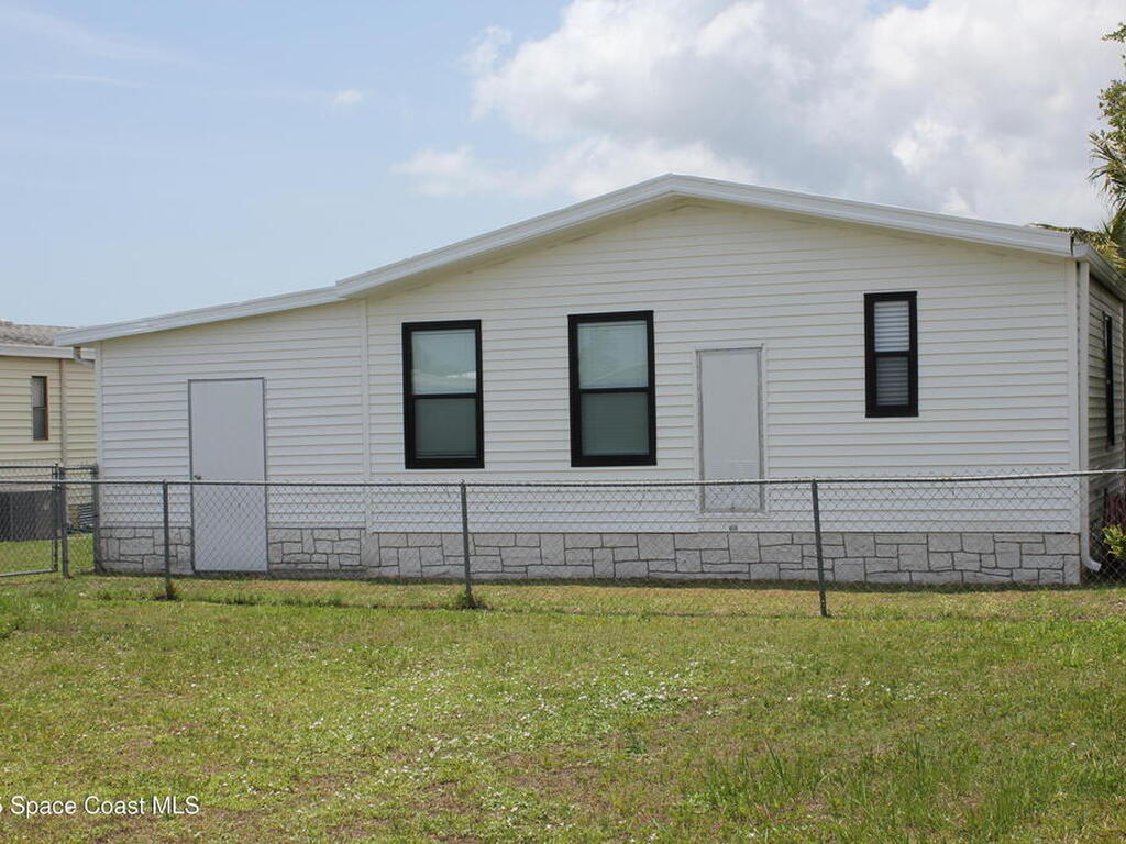 449 Dolphin Circle, Barefoot Bay, FL 32976