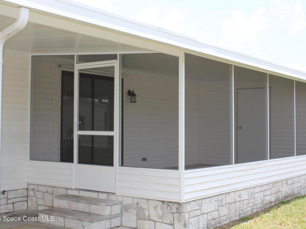 449 Dolphin Circle, Barefoot Bay, FL 32976