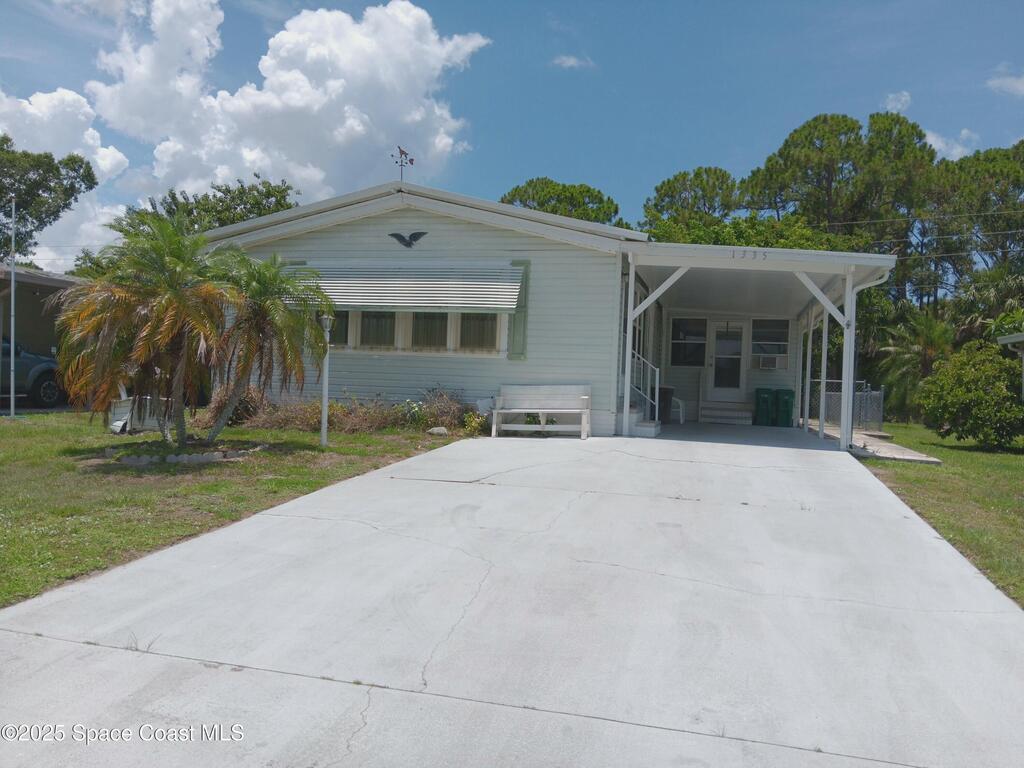1335 Barefoot Circle, Barefoot Bay, FL 32976