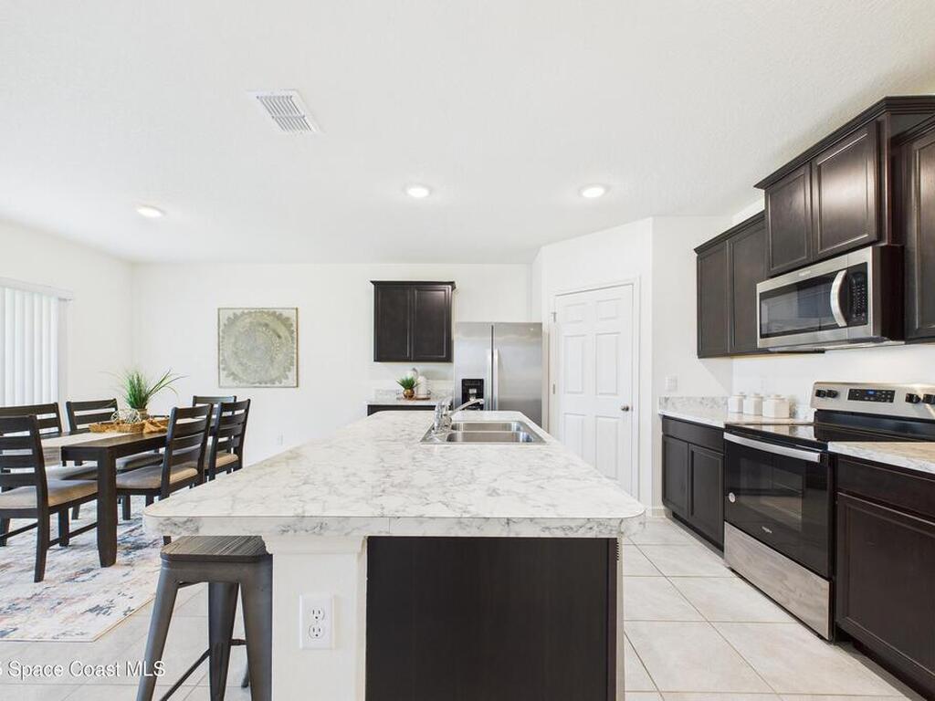 3479 Burrowing Owl Drive, Mims, FL 32754