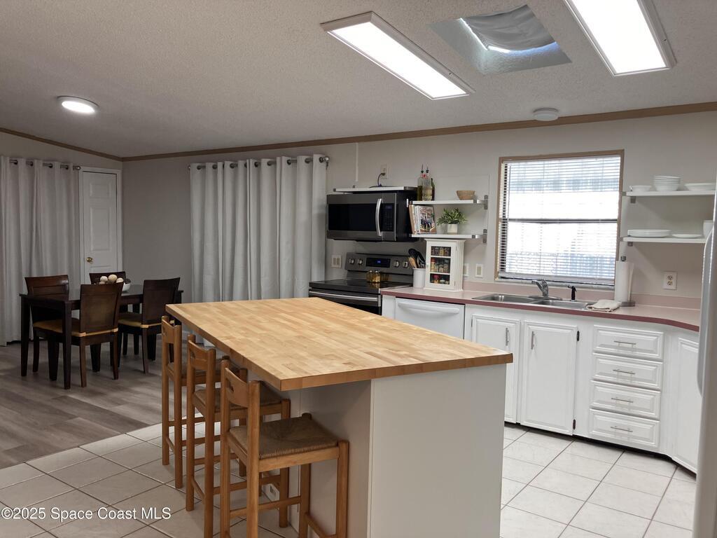 1229 Calusa Drive, Barefoot Bay, FL 32976