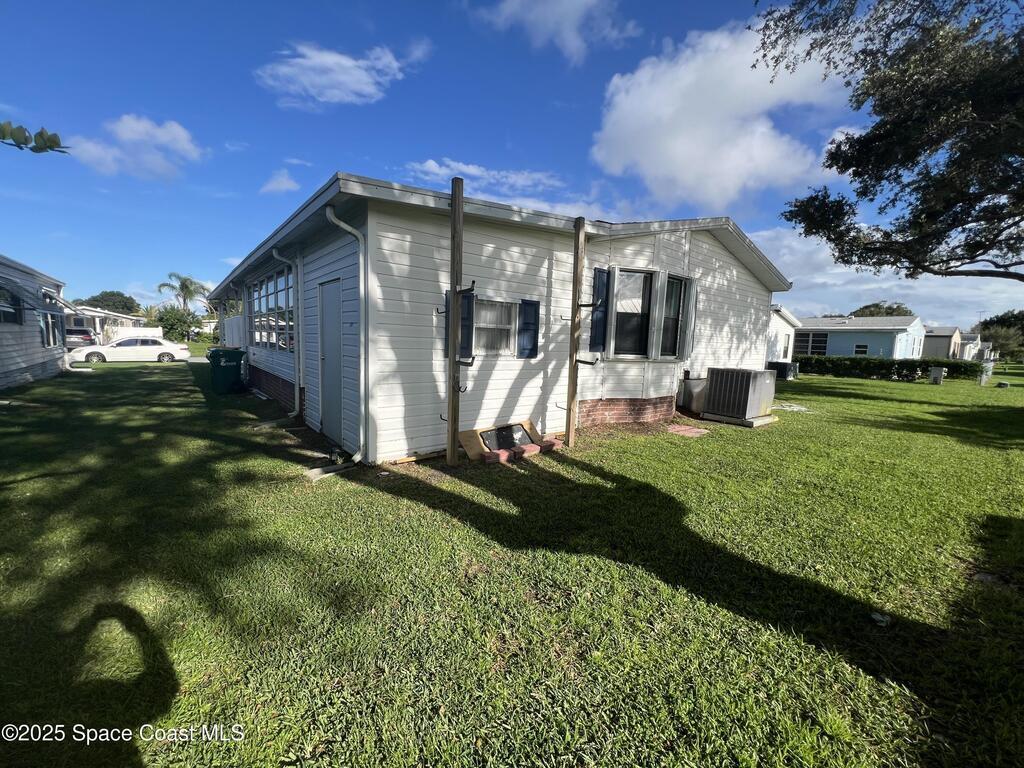 1229 Calusa Drive, Barefoot Bay, FL 32976