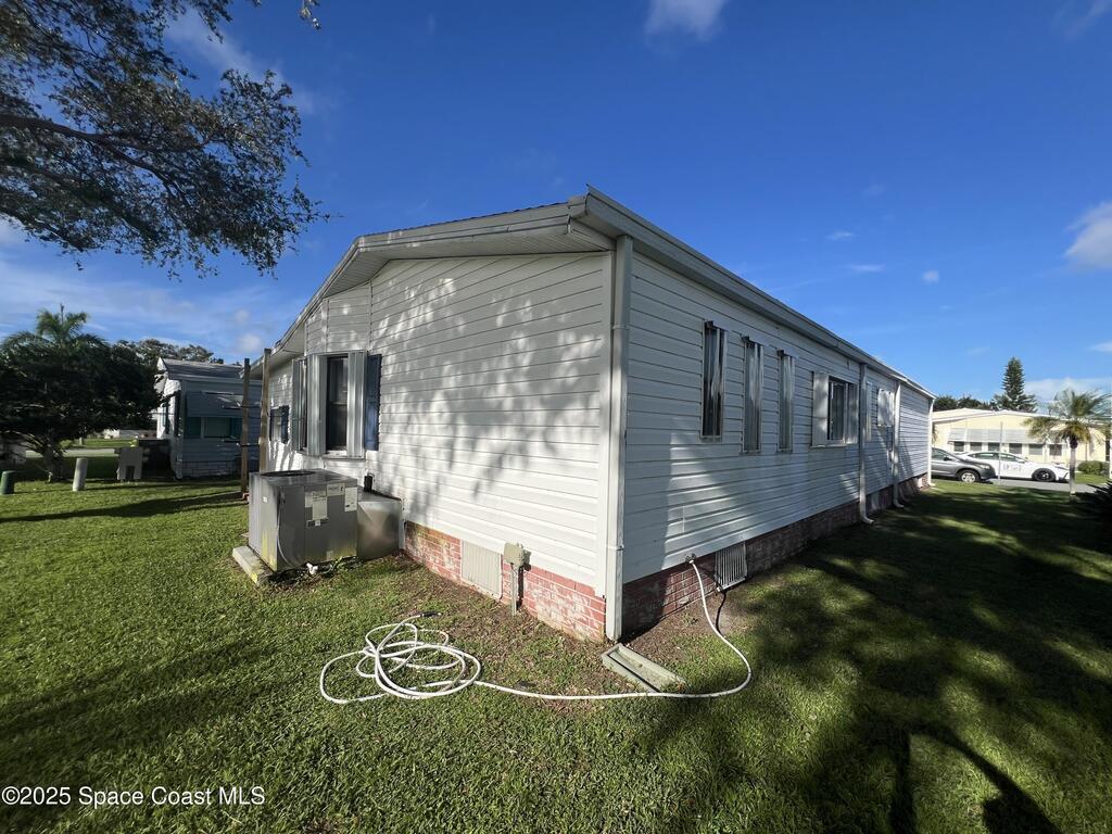 1229 Calusa Drive, Barefoot Bay, FL 32976
