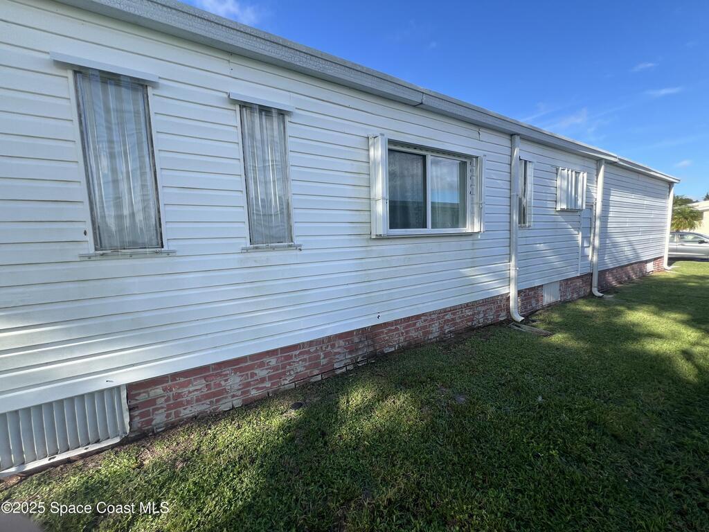 1229 Calusa Drive, Barefoot Bay, FL 32976