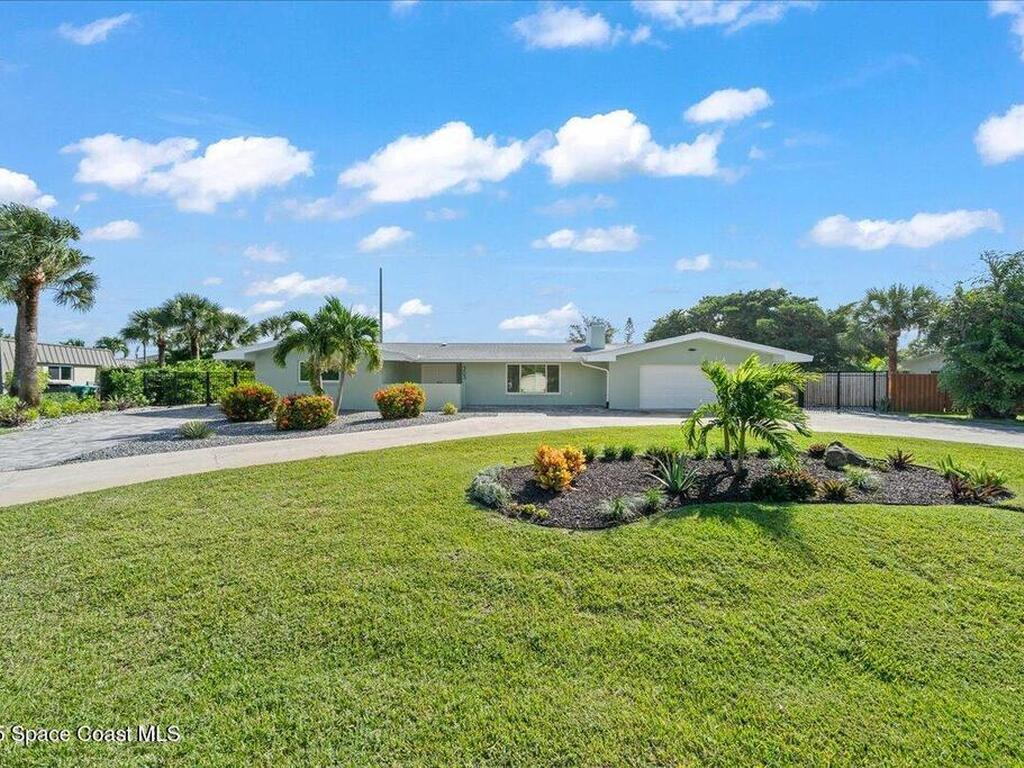 303 Hibiscus Trail, Melbourne Beach, FL 32951