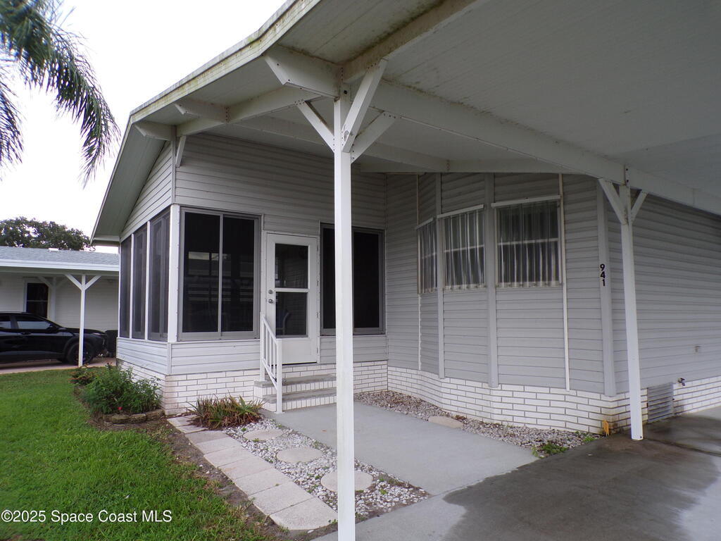 941 Wren Circle, Barefoot Bay, FL 32976