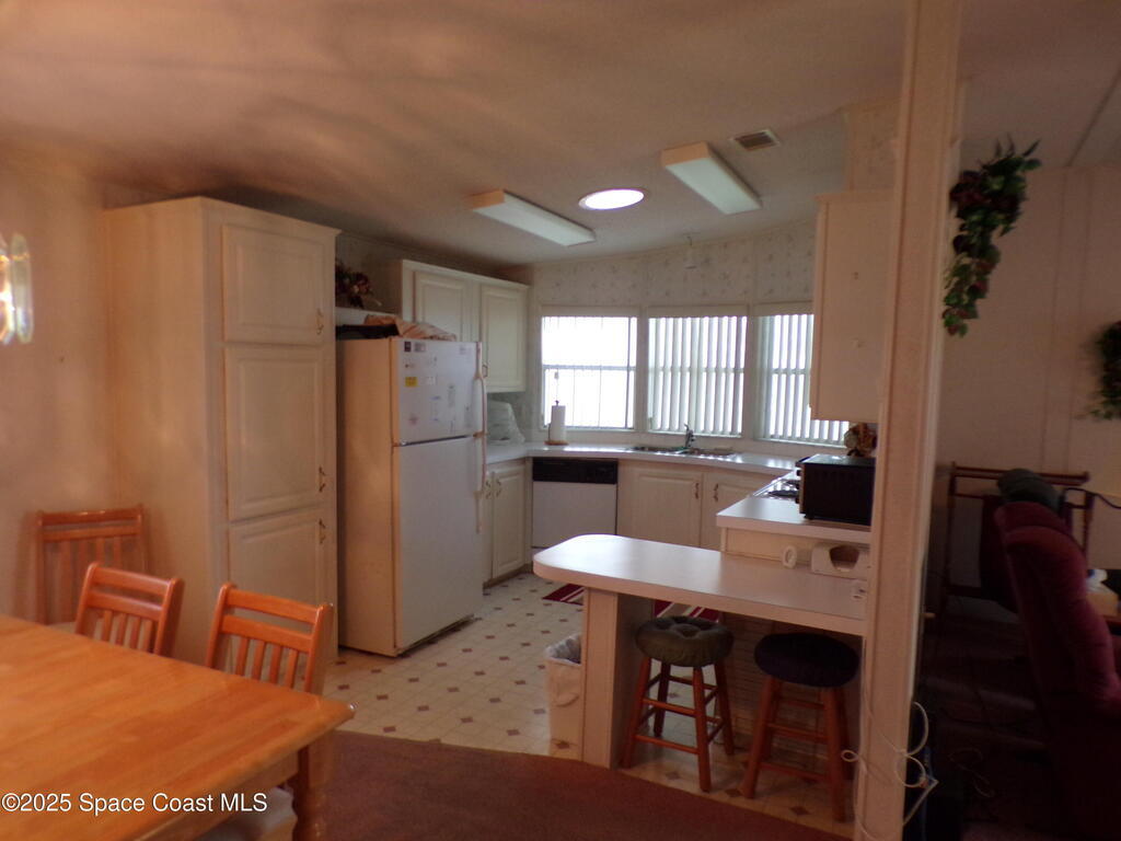 941 Wren Circle, Barefoot Bay, FL 32976