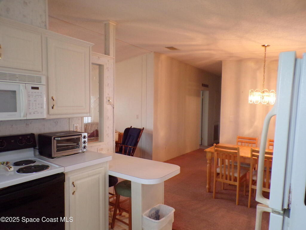 941 Wren Circle, Barefoot Bay, FL 32976