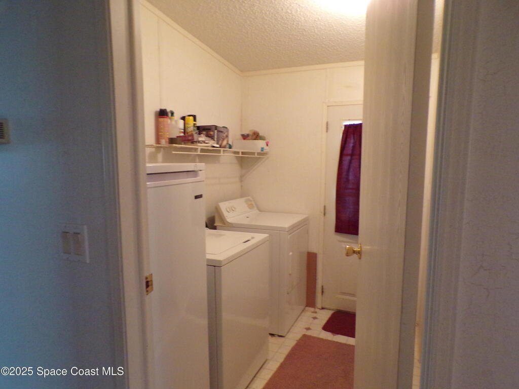 941 Wren Circle, Barefoot Bay, FL 32976