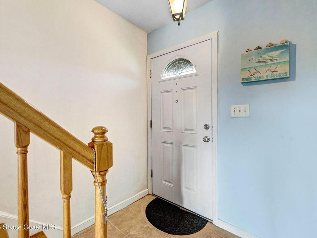 152 E East Colonial Court Court, Indian Harbour Beach, FL 32937