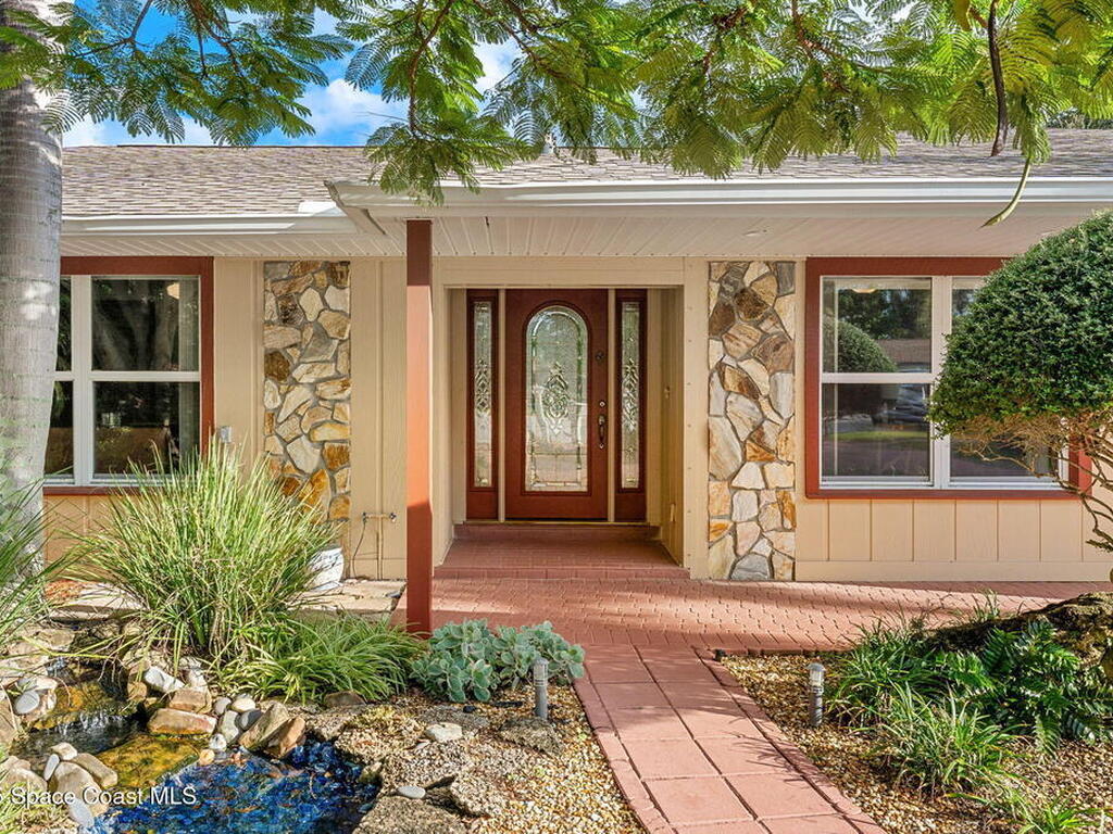 4 Colonial Way, Indian Harbour Beach, FL 32937