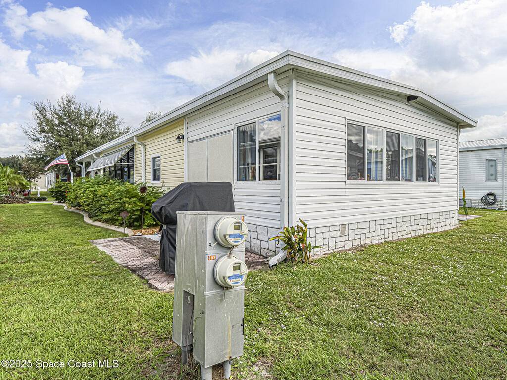 409 Avocado Drive, Barefoot Bay, FL 32976