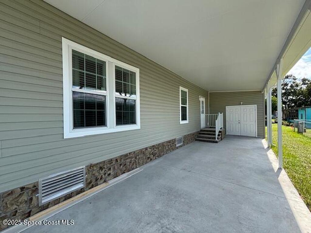 571 Tarpon Drive, Barefoot Bay, FL 32976