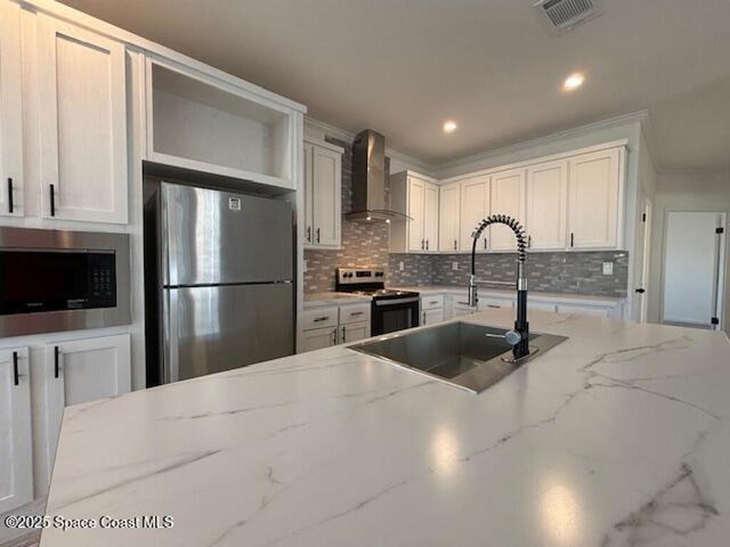 571 Tarpon Drive, Barefoot Bay, FL 32976