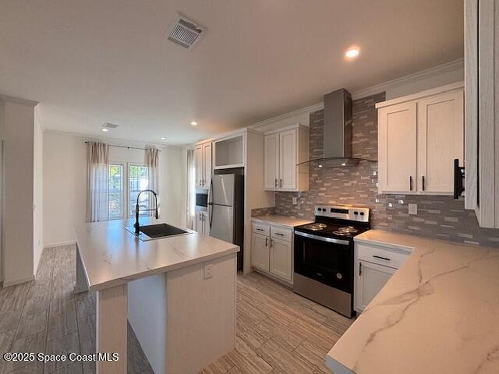 571 Tarpon Drive, Barefoot Bay, FL 32976