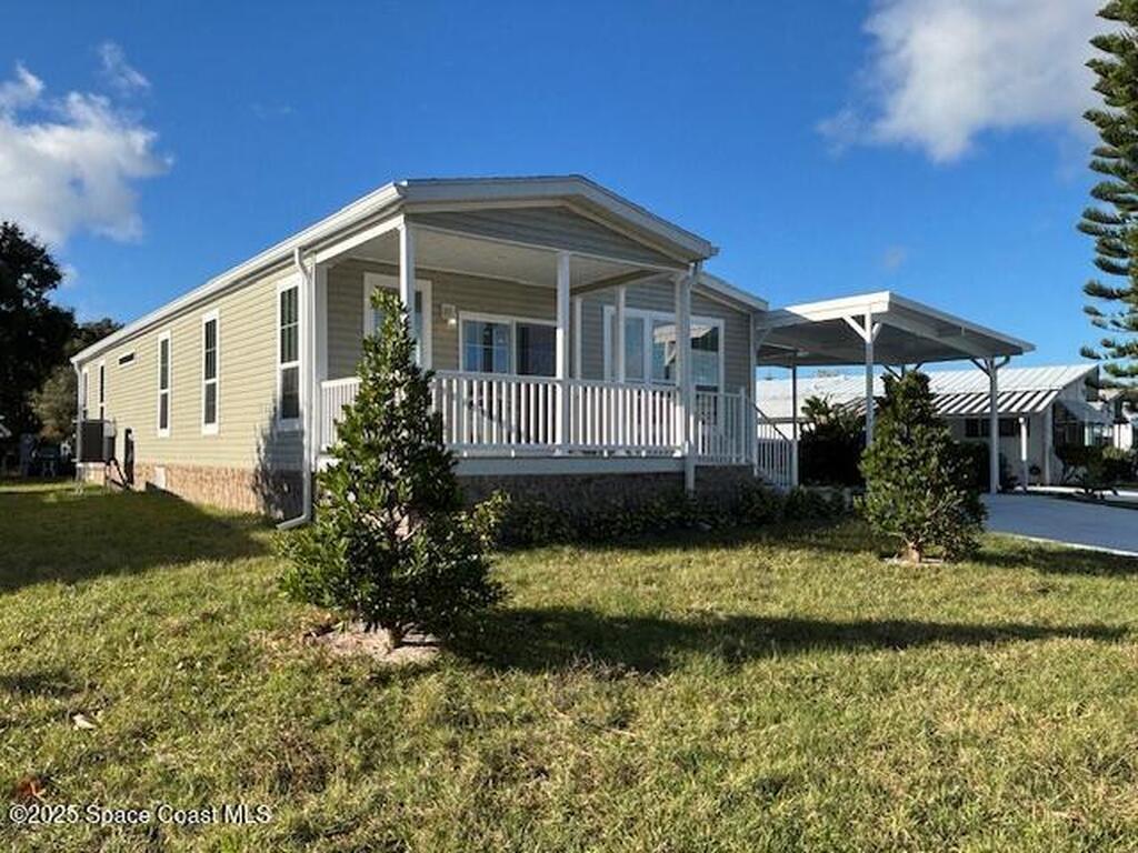 723 Hyacinth Circle, Barefoot Bay, FL 32976