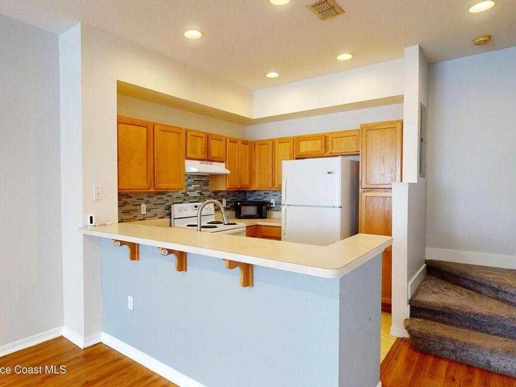 105 Turpial Way, Melbourne, FL 32901