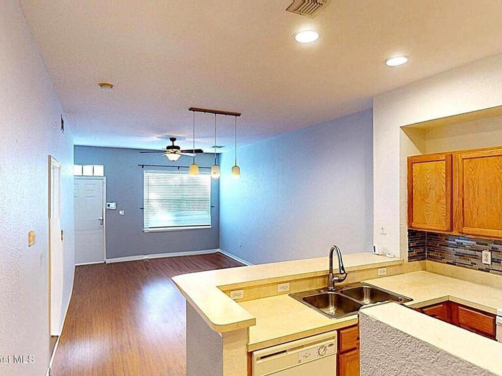 105 Turpial Way, Melbourne, FL 32901