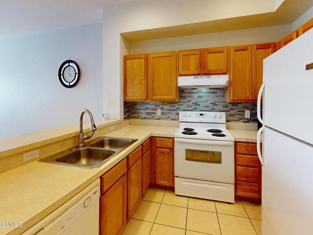 105 Turpial Way, Melbourne, FL 32901