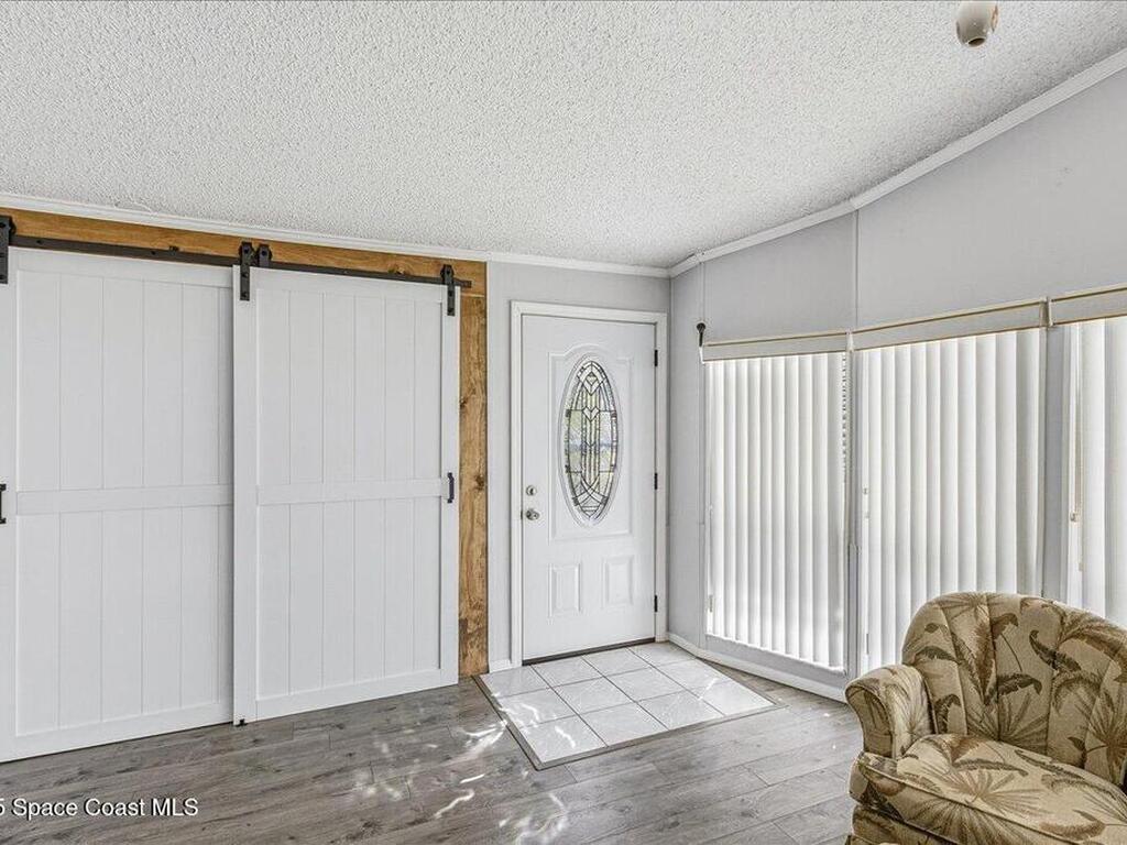 1131 Tequesta Drive, Barefoot Bay, FL 32976