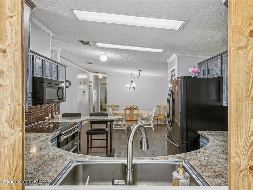 1131 Tequesta Drive, Barefoot Bay, FL 32976