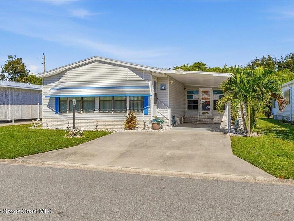 1131 Tequesta Drive, Barefoot Bay, FL 32976