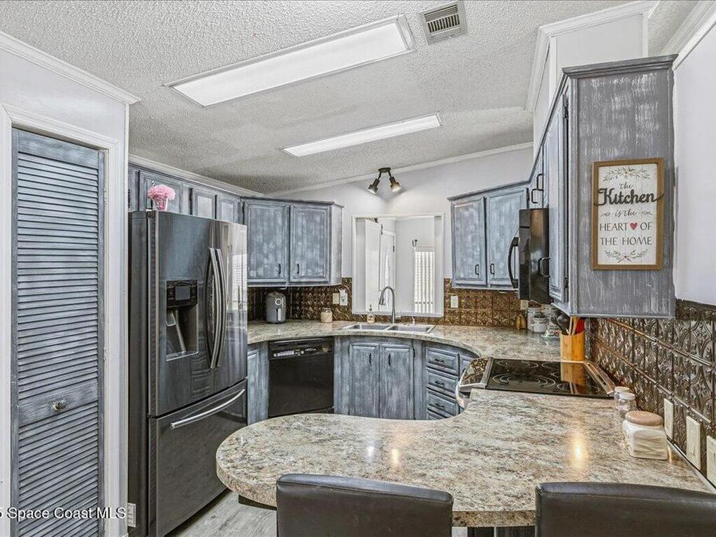 1131 Tequesta Drive, Barefoot Bay, FL 32976