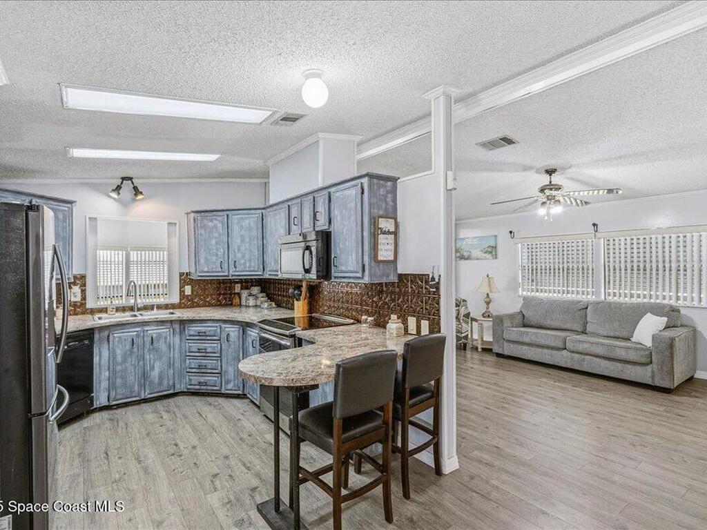 1131 Tequesta Drive, Barefoot Bay, FL 32976