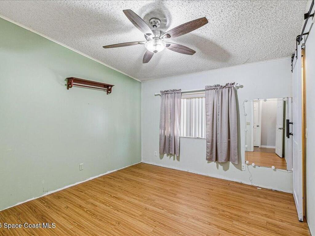 1131 Tequesta Drive, Barefoot Bay, FL 32976