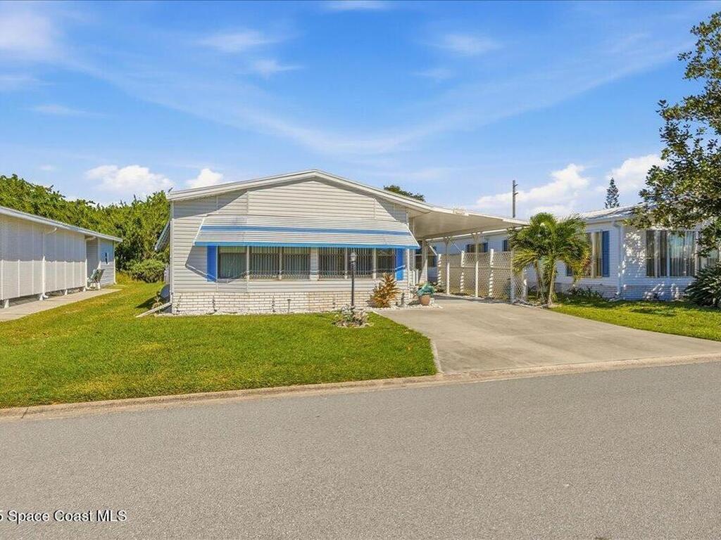1131 Tequesta Drive, Barefoot Bay, FL 32976