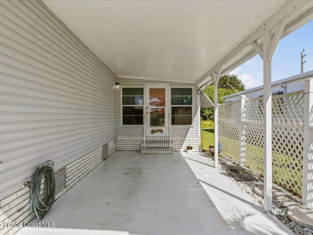 1131 Tequesta Drive, Barefoot Bay, FL 32976