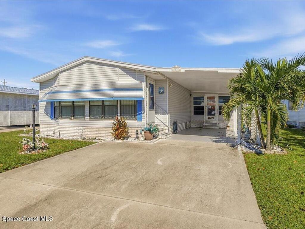 1131 Tequesta Drive, Barefoot Bay, FL 32976