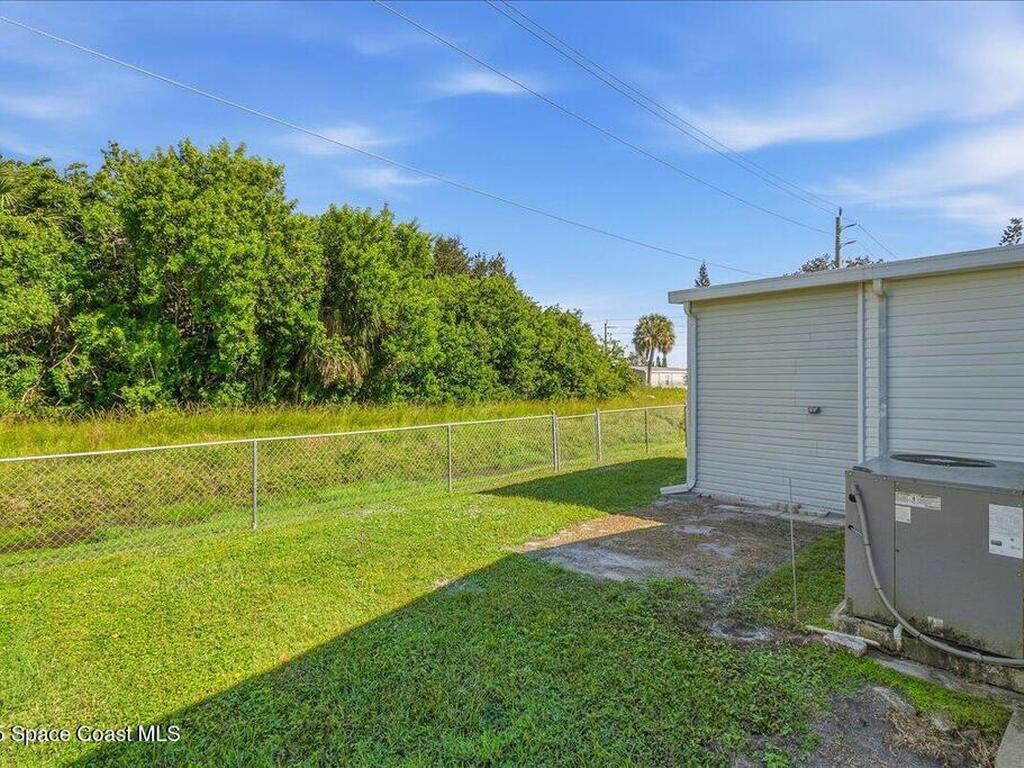 1131 Tequesta Drive, Barefoot Bay, FL 32976