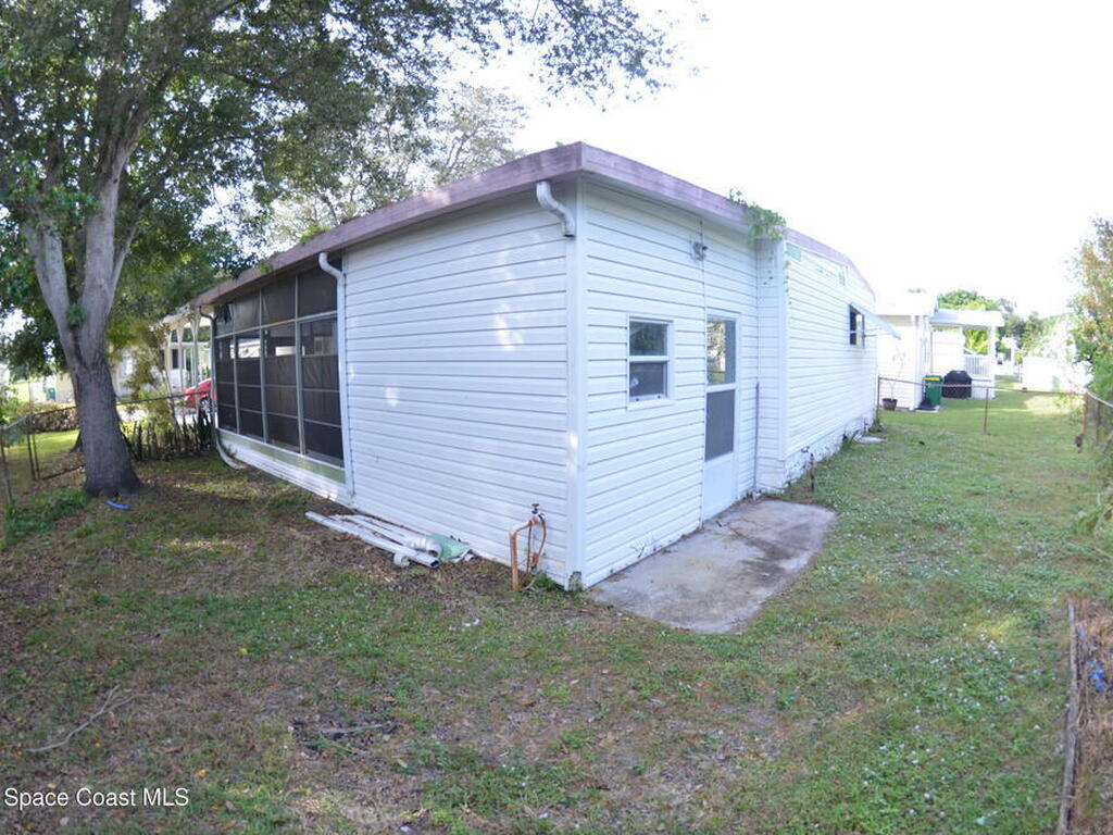 1056 Wren Circle, Barefoot Bay, FL 32976