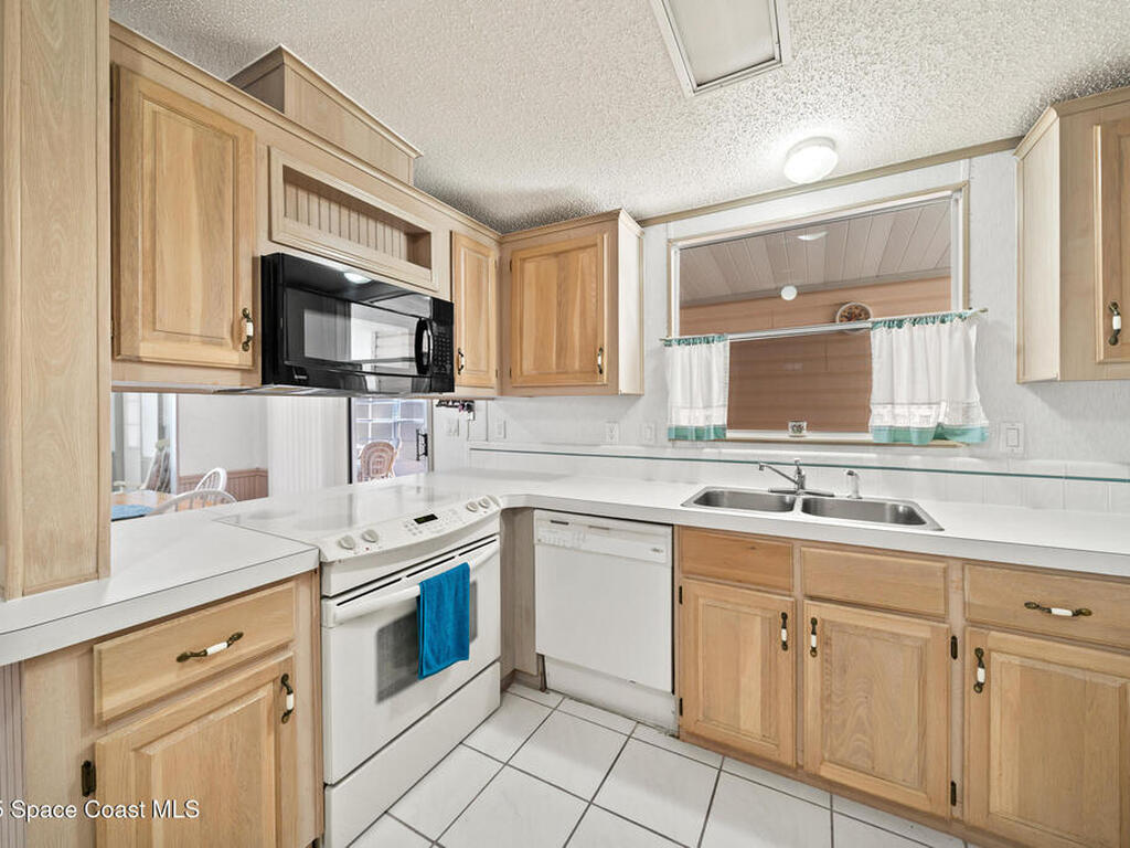 720 Periwinkle Circle, Barefoot Bay, FL 32976