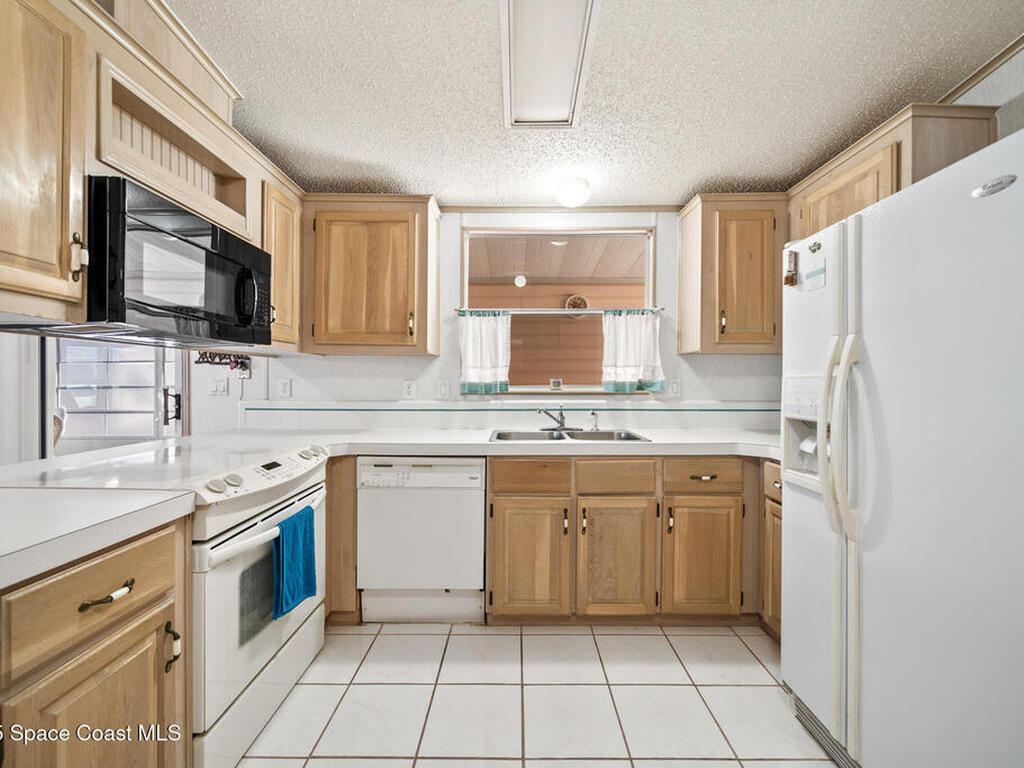 720 Periwinkle Circle, Barefoot Bay, FL 32976