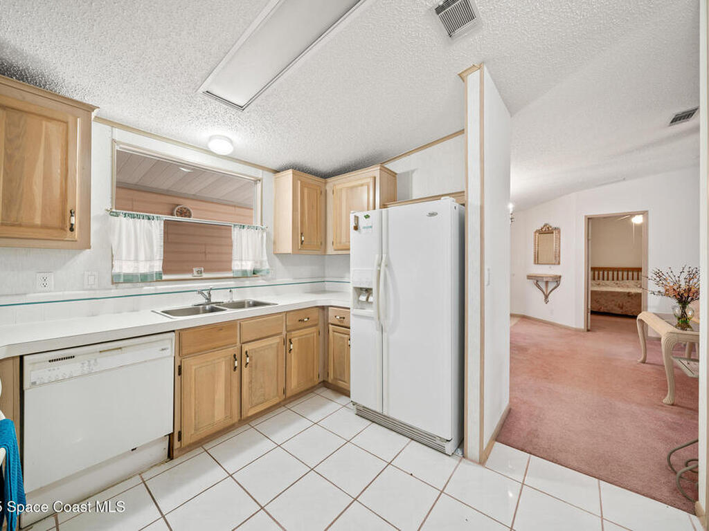 720 Periwinkle Circle, Barefoot Bay, FL 32976