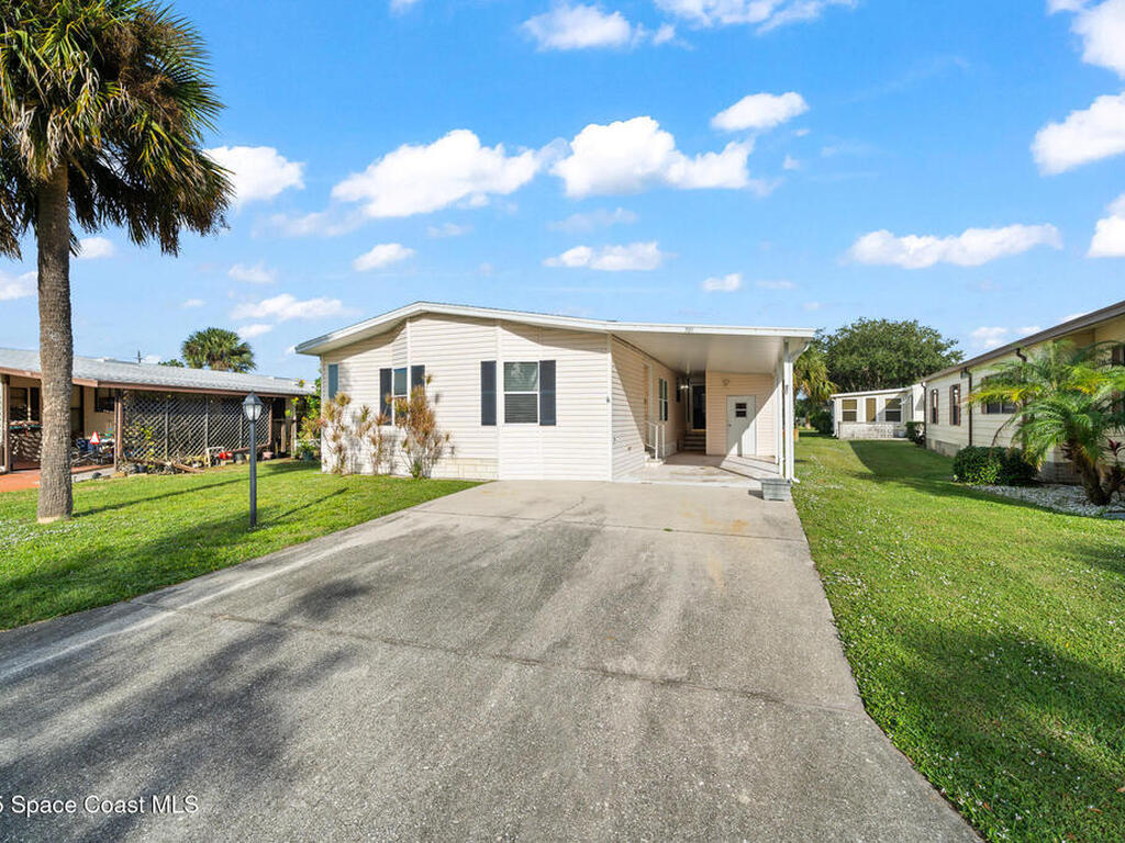720 Periwinkle Circle, Barefoot Bay, FL 32976