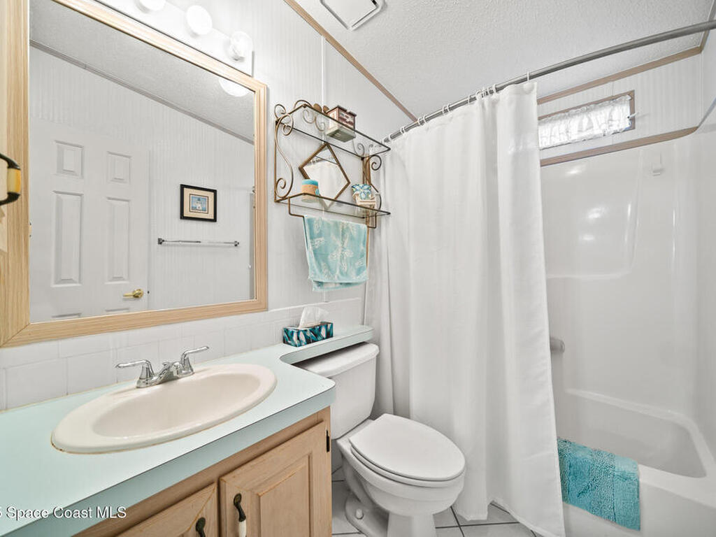 720 Periwinkle Circle, Barefoot Bay, FL 32976